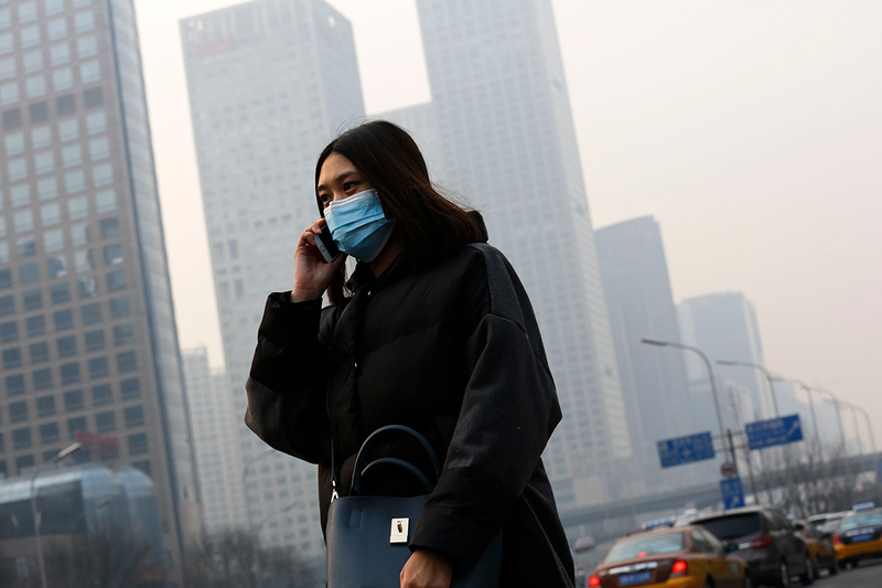 Illustration for article titled Las autoridades chinas decretan la alerta roja por contaminación en Pekín